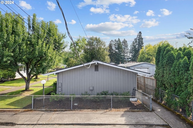 view of home's exterior featuring a yard