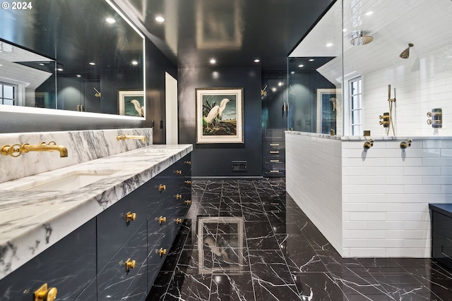 bathroom with a shower and vanity