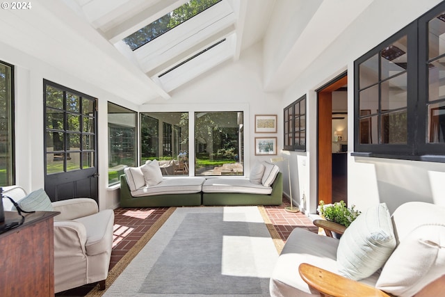 sunroom with lofted ceiling with skylight