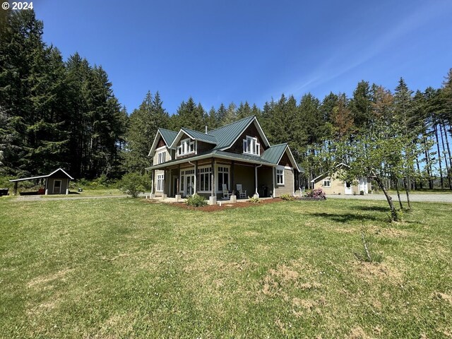 view of front of home featuring a porch and a front yard