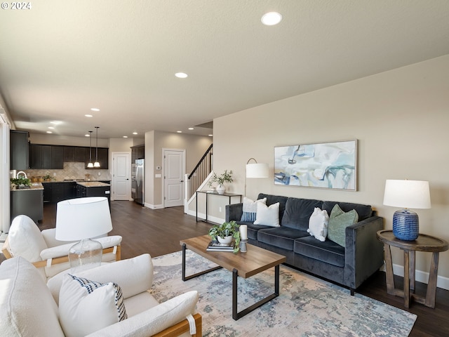 living room featuring dark hardwood / wood-style flooring