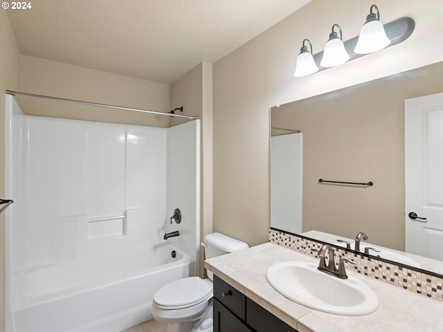 full bathroom featuring vanity, a textured ceiling, tub / shower combination, and toilet