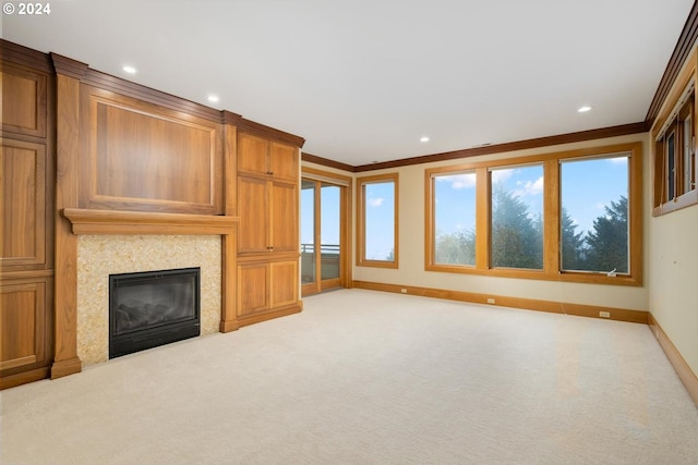 unfurnished living room featuring light carpet and crown molding