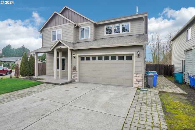 view of front of property featuring a garage