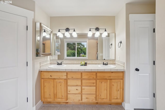 bathroom featuring vanity and tile patterned flooring