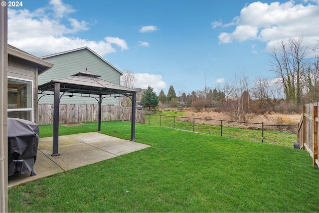 view of yard with a gazebo and a patio area