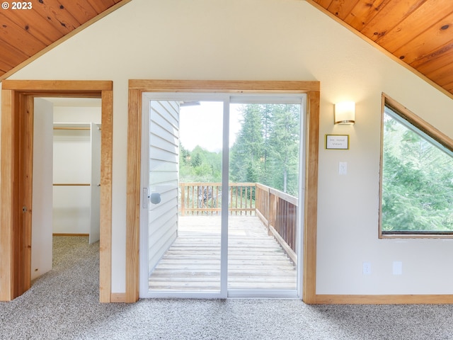 doorway to outside featuring vaulted ceiling, carpet flooring, wood ceiling, and baseboards