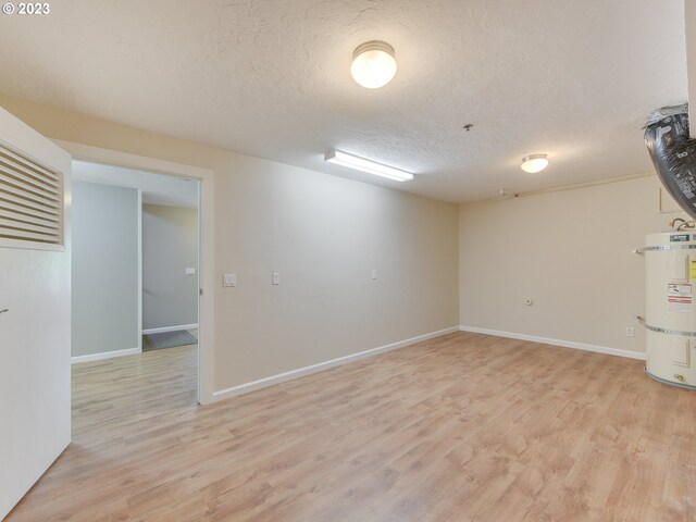 living room with wooden walls, carpet floors, and a tile fireplace