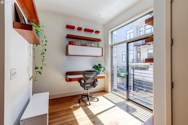 home office featuring light wood-type flooring