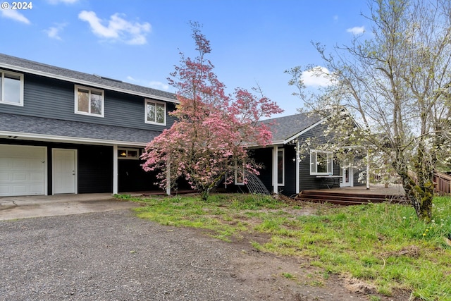 view of front of property with a garage