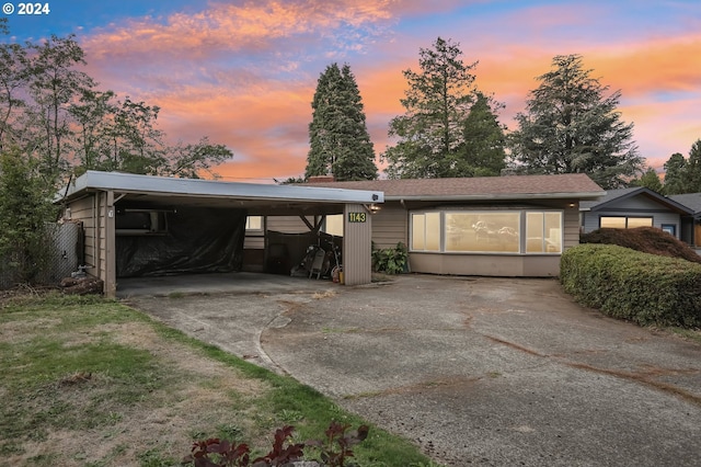 view of front of house featuring a carport