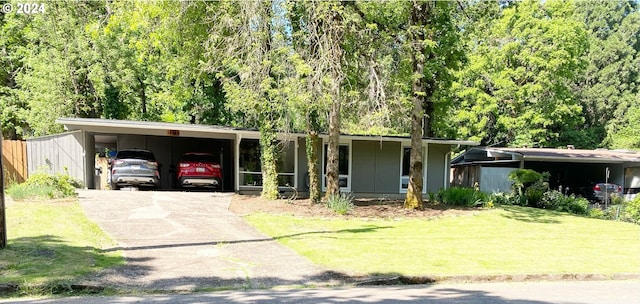 single story home with a front yard