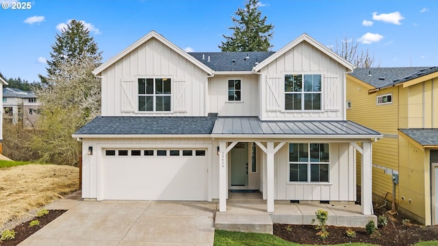 modern inspired farmhouse featuring driveway, board and batten siding, an attached garage, a shingled roof, and covered porch