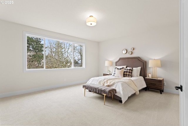 carpeted bedroom with baseboards