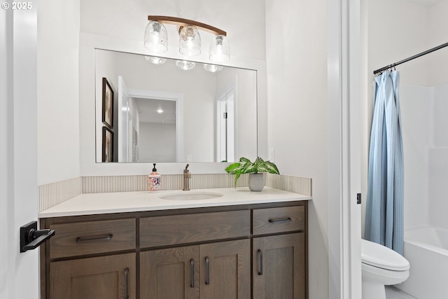 full bathroom with toilet, vanity, and shower / bath combination with curtain