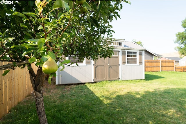 view of shed featuring a fenced backyard