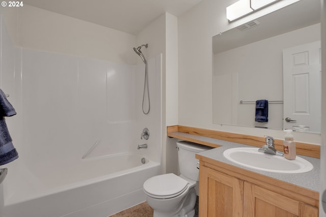 full bathroom with tile patterned floors, vanity, bathing tub / shower combination, and toilet