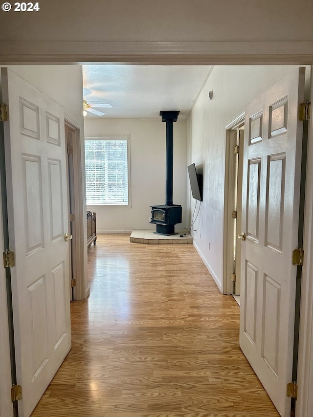 hall with light hardwood / wood-style flooring