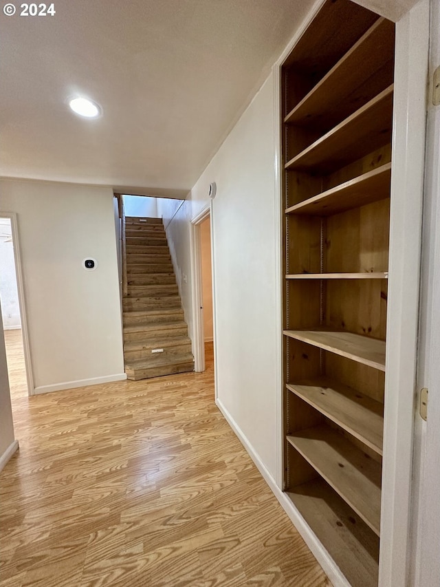 hallway featuring light hardwood / wood-style flooring