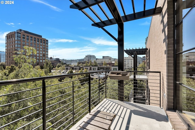 balcony featuring a pergola