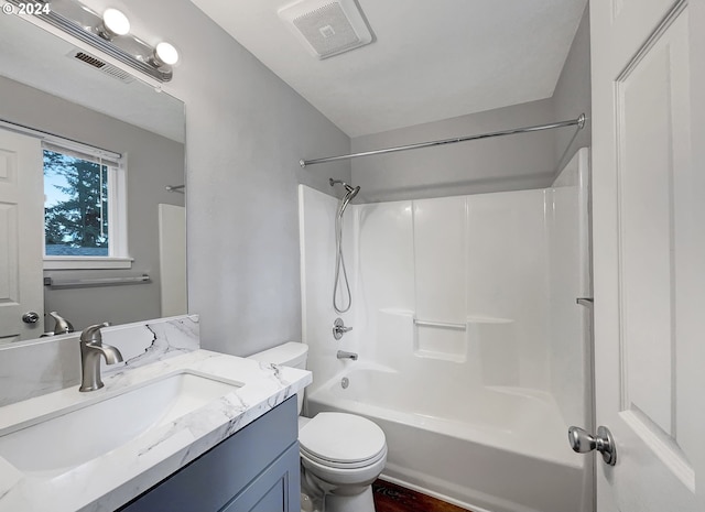 full bathroom with shower / bath combination, toilet, and vanity