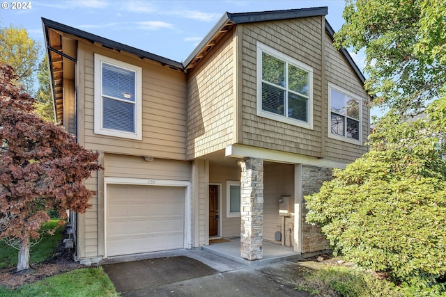 view of front of home with a garage