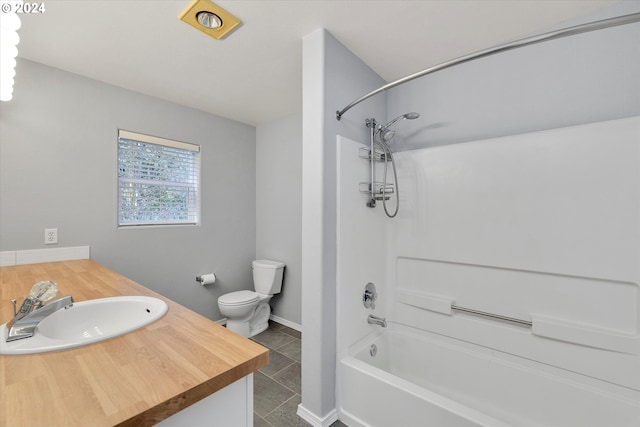 full bathroom featuring vanity, tile patterned flooring, shower / bathing tub combination, and toilet