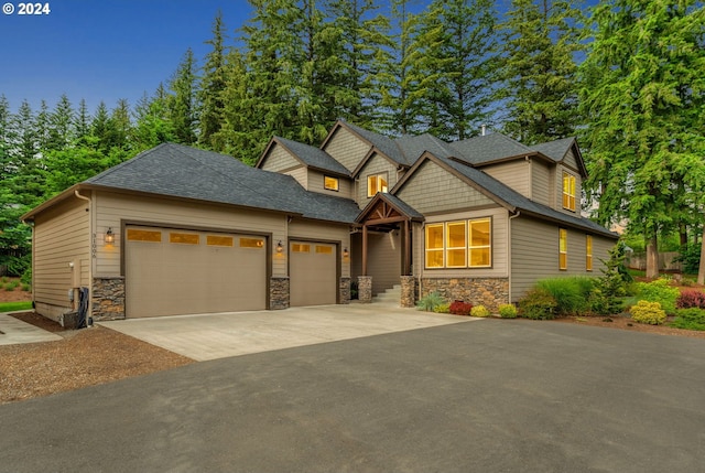 craftsman house with a garage