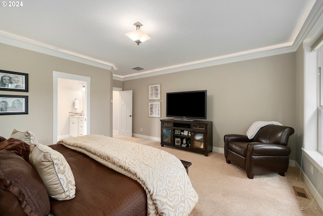 bedroom featuring light carpet, connected bathroom, multiple windows, and crown molding