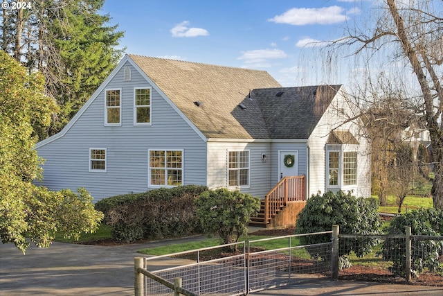 view of new england style home