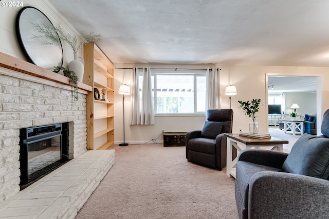 living room with a fireplace and carpet flooring