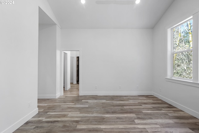 spare room with light hardwood / wood-style flooring