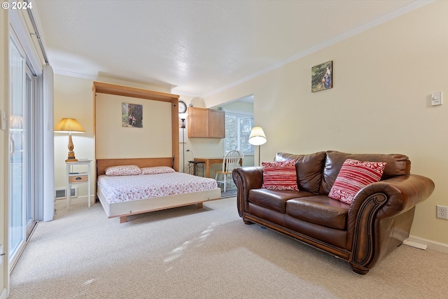 carpeted bedroom featuring crown molding