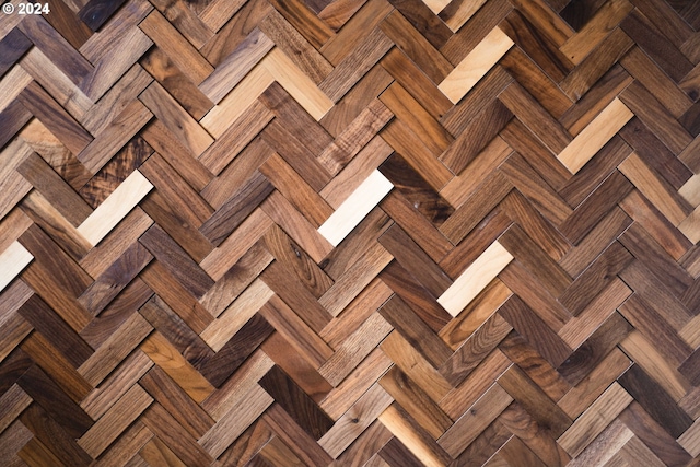 interior details featuring parquet flooring