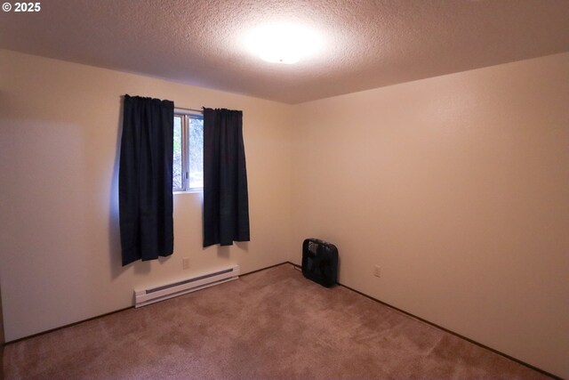 unfurnished bedroom featuring light carpet and a baseboard heating unit