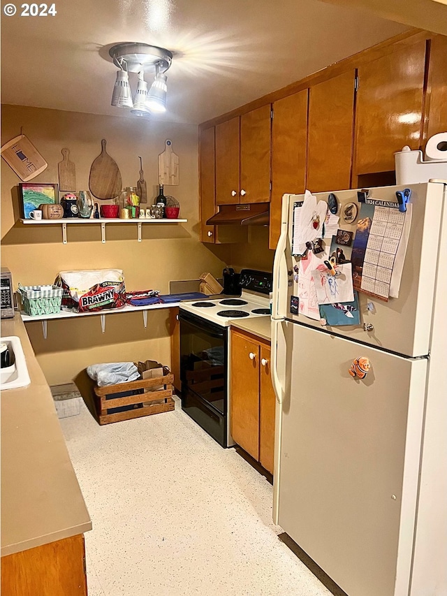 kitchen with white appliances and sink