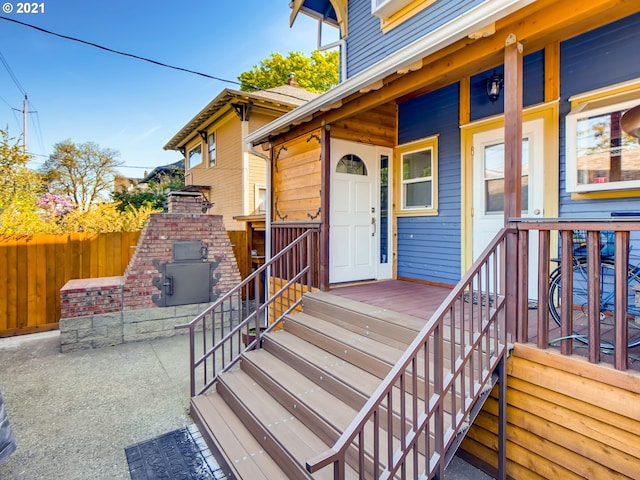 property entrance with a fireplace