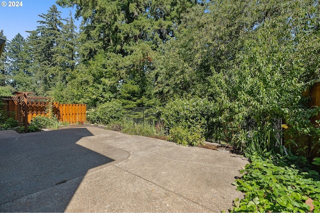 view of patio with fence