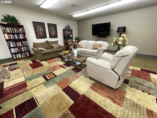 living room with a textured ceiling