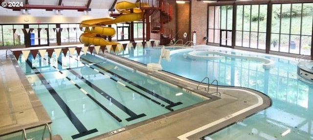 view of pool featuring a water slide