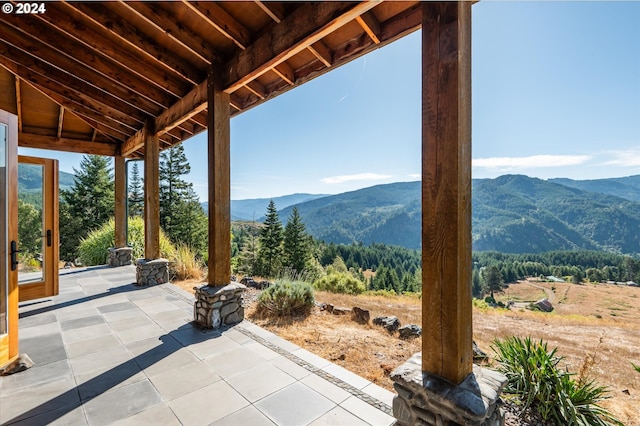 view of terrace featuring a mountain view