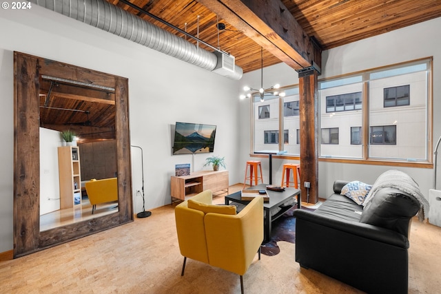 living room featuring a notable chandelier, beamed ceiling, and wooden ceiling