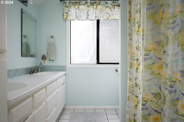 bathroom with vanity and tile patterned floors