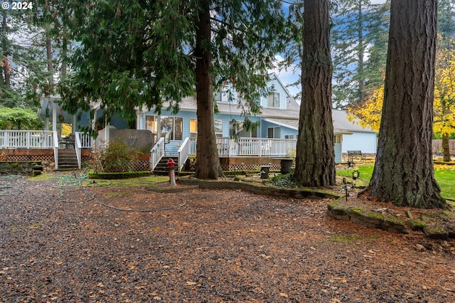 view of front of house with a deck