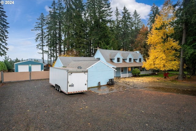 view of front facade featuring an outbuilding