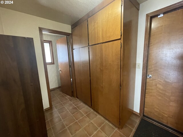 bathroom featuring toilet, walk in shower, and vanity