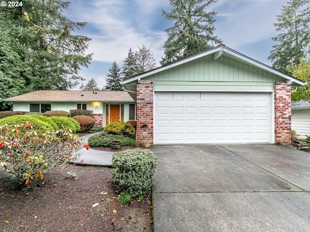 single story home with a garage