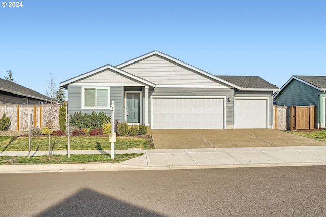 single story home with a front lawn and a garage