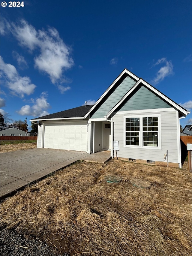 view of front of house with a garage