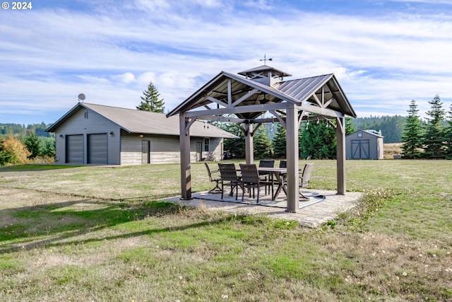 surrounding community with a yard, a storage shed, a patio, and a garage